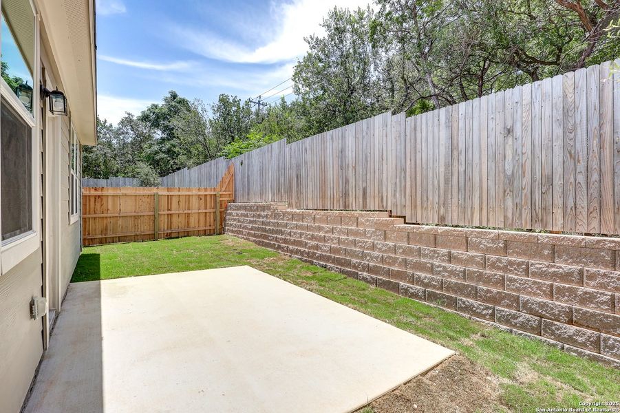 Front exterior of a new home in Rosemont Hill, San Antonio, TX, highlighting curb appeal (Image 1).