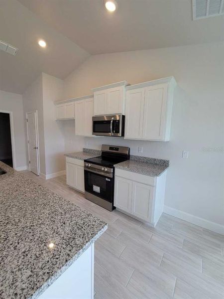 Furnished interior view inside a new home in , Ocala (Image 6).