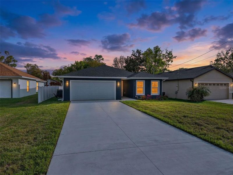 Front exterior of a new home in , Orlando, FL, highlighting curb appeal (Image 28).