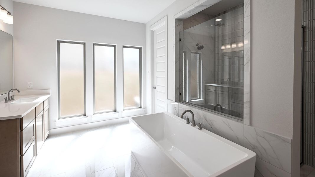 Furnished interior view inside a new home in 6 Creeks, Kyle (Image 9).