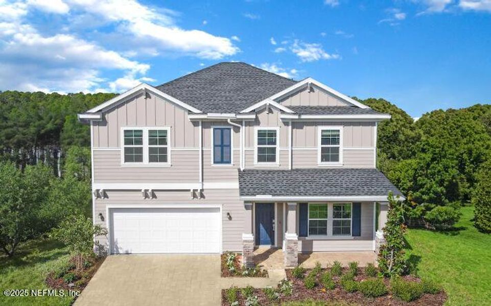 Front exterior of a new home in Silver Falls Single Family at SilverLeaf: Silver Falls 50s at SilverLeaf, St. Augustine, FL, highlighting curb appeal (Image 1). Front exterior of a new home in Silver Falls Single Family at SilverLeaf: Silver Falls 50s at SilverLeaf, St. Augustine, FL, highlighting curb appeal (Image 1).