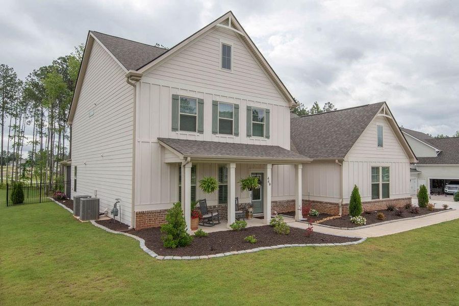 Front exterior of a new home in , Senoia, GA, highlighting curb appeal (Image 42). Front exterior of a new home in , Senoia, GA, highlighting curb appeal (Image 42).
