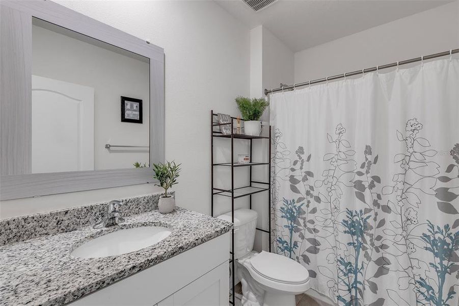 Furnished interior view inside a new home in Groveside at Ormond Station, Ormond Beach (Image 37).