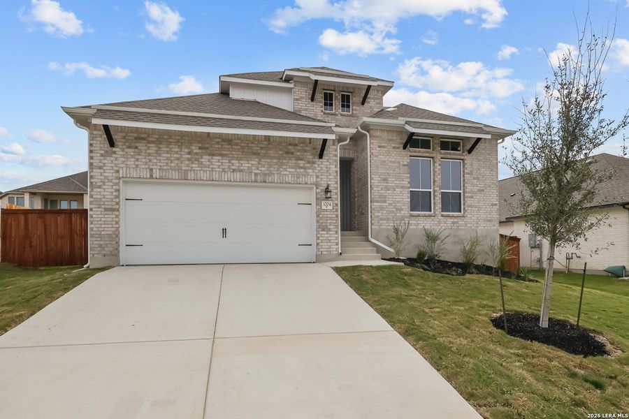 Front exterior of a new home in Homestead, Schertz, TX, highlighting curb appeal (Image 21).