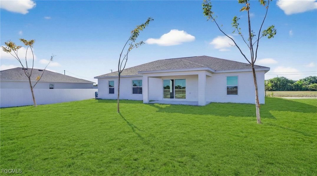 Exterior details and patio area of a home in Cape Coral, Cape Coral (Image 4).