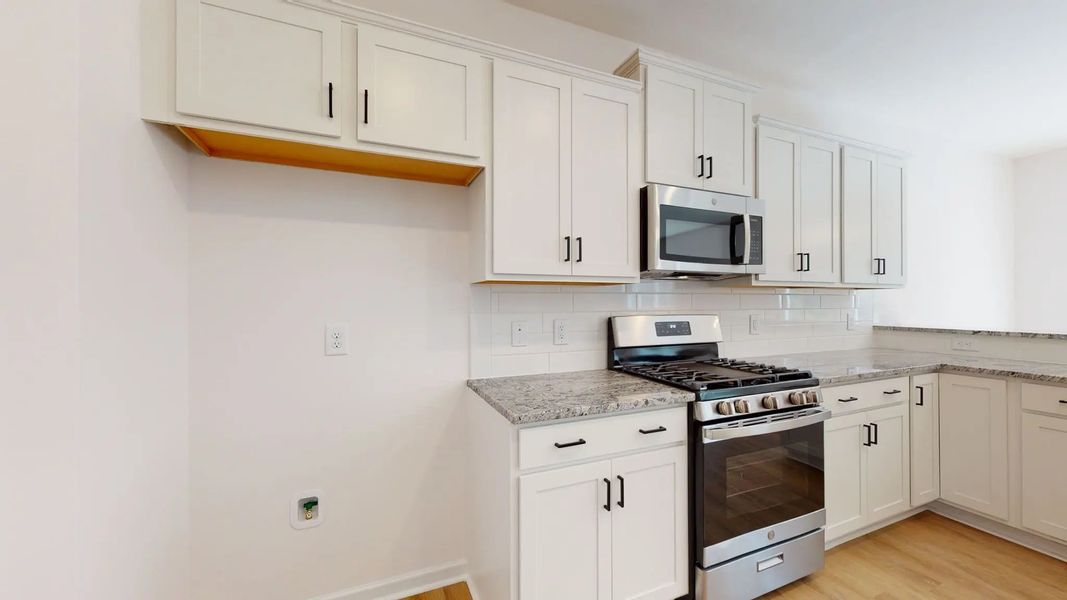 Representative furnished interior of a home built from the Catherine A by JC Jackson Homes,LLC in Heritage Pointe, Newport (Image 13).