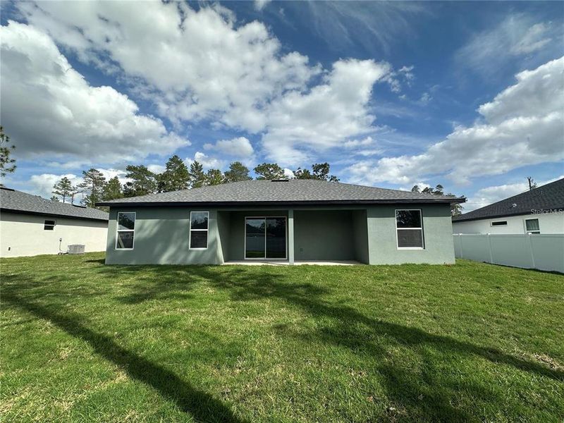 Exterior details and patio area of a home in Marion Oaks, Ocala (Image 4).