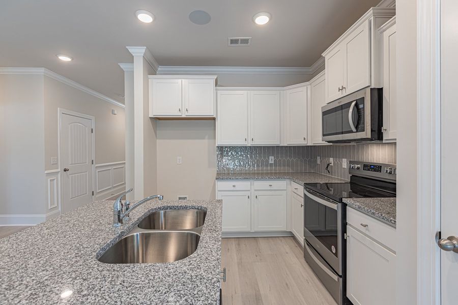 Representative furnished interior of a home built from the Habersham II by Great Southern Homes in Old Charleston Acres, Pelion (Image 9).