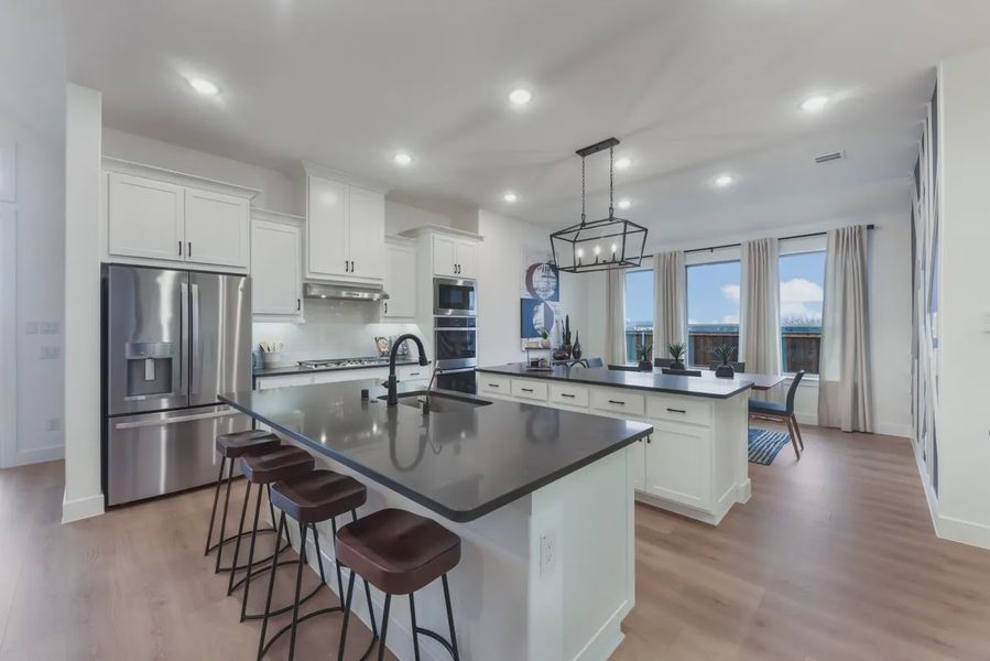 Representative furnished interior of a home built from the Laurel by Chesmar Homes in Canyon Falls, Argyle (Image 4).