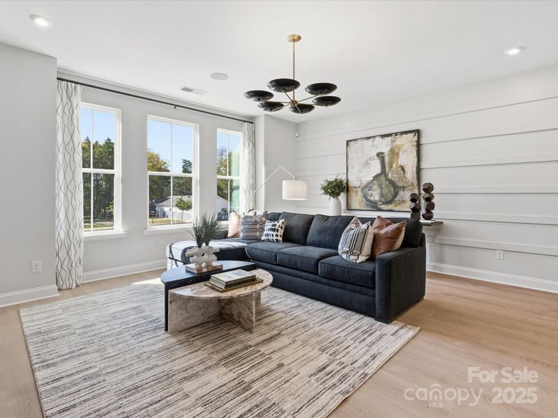 Great Room with Wall of Windows. *Model Photos | Actual Finishes, Structural Selections, and Orientation May Vary. Great Room with Wall of Windows. *Model Photos | Actual Finishes, Structural Selections, and Orientation May Vary.