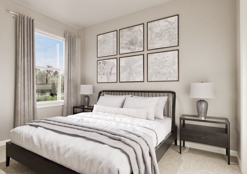 Cozy bedroom featuring a black bed frame, light gray blankets, framed maps on the wall, and a bedside lamp by a large window. Cozy bedroom featuring a black bed frame, light gray blankets, framed maps on the wall, and a bedside lamp by a large window.