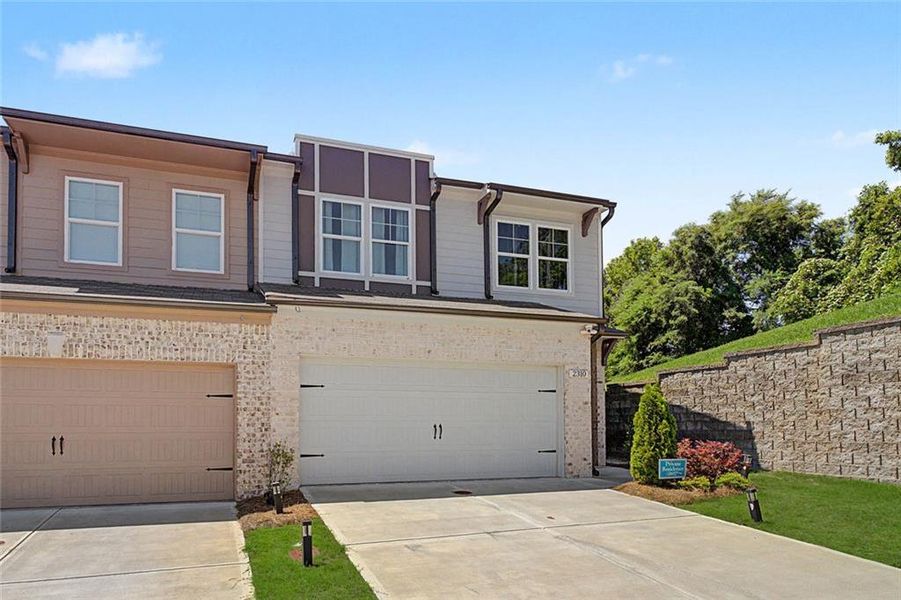 Front exterior of a new home in , Atlanta, GA, highlighting curb appeal (Image 25).