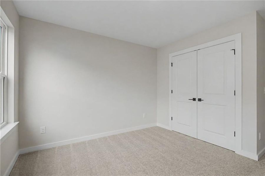 Spacious, unfurnished interior of a new home in The Park at Brighton, Locust Grove (Image 20).