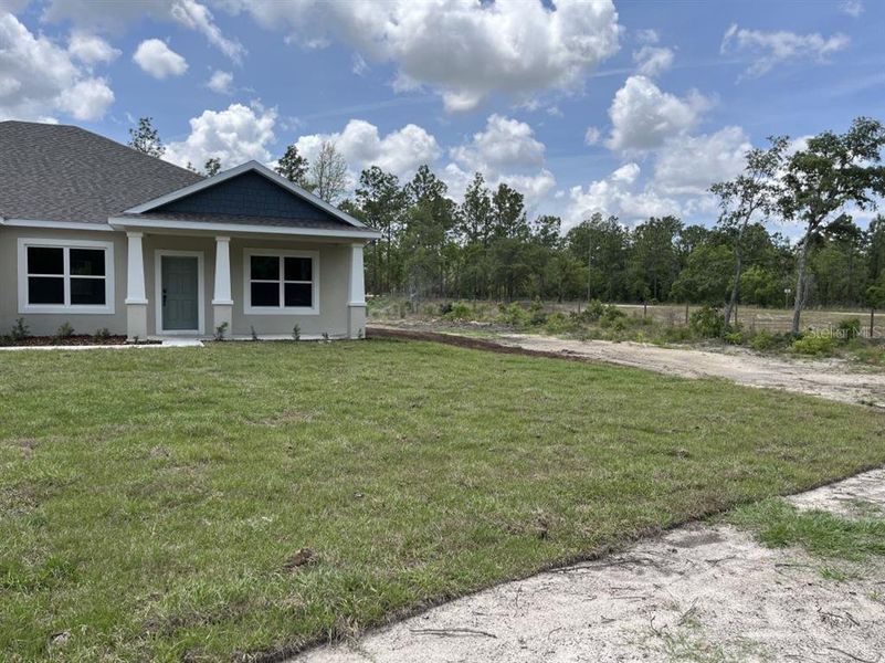 Exterior details and patio area of a home in , Ocala (Image 3).