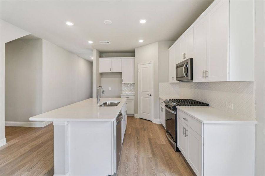 Furnished interior view inside a new home in Westmoor, Sherman (Image 6).