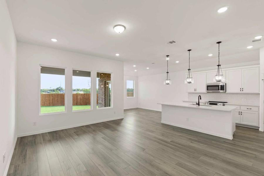 Open Kitchen-Living-Dining Room featuring the Harmony Collection