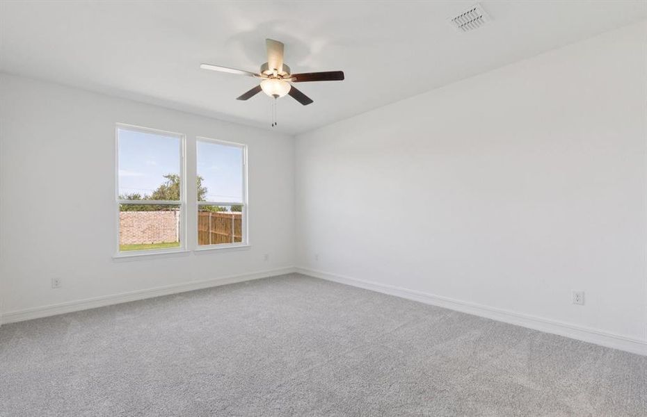 Elegant owner's suite with large windows *real home pictured Elegant owner's suite with large windows *real home pictured