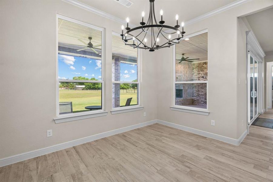 Great Dining Area opens to the Kitchen & Living Room with Great Backyard View & Chandelier