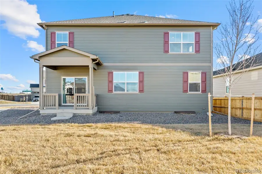 Exterior details and patio area of a home in Vantage, Berthoud (Image 3).
