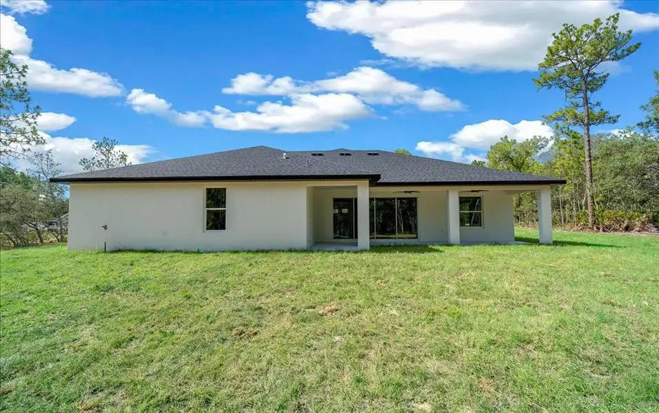 Exterior details and patio area of a home in , Weeki Wachee (Image 42). Exterior details and patio area of a home in , Weeki Wachee (Image 42).