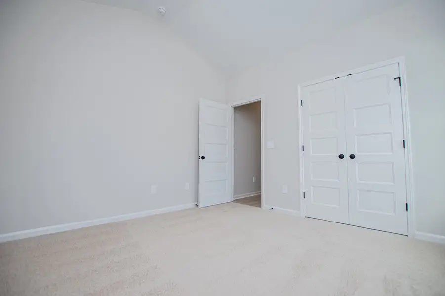 Spacious, unfurnished interior of a new home in WOODMONT RESERVE, Roopville (Image 69).