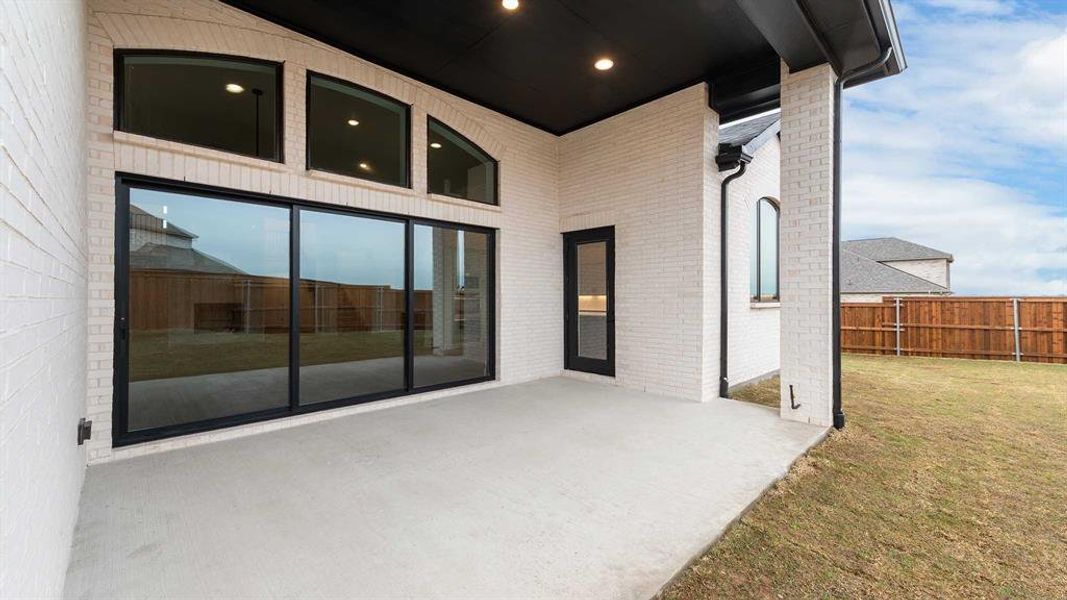 Exterior details and patio area of a home in Terraces, Rockwall (Image 2). Exterior details and patio area of a home in Terraces, Rockwall (Image 2).