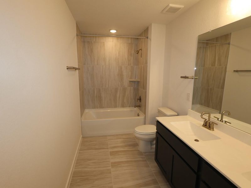 Furnished interior view inside a new home in Marvida, Cypress (Image 5).