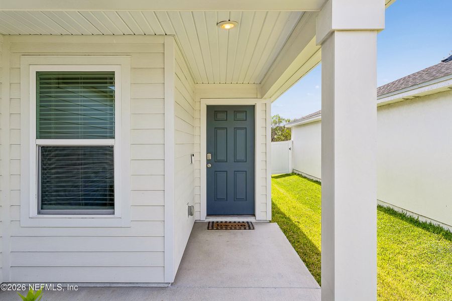 Exterior details and patio area of a home in Lakes at Bella Lago – Classic Series, Green Cove Springs (Image 4).