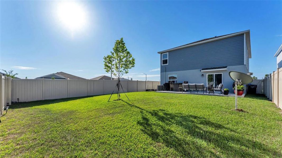 Exterior details and patio area of a home in Peace Creek Reserve, Winter Haven (Image 4).