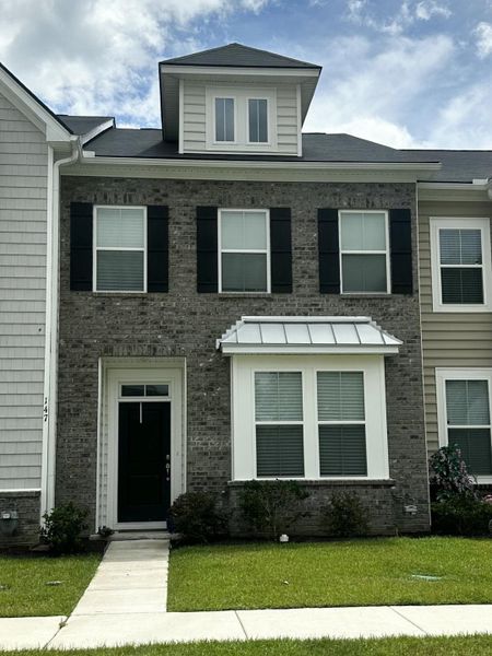 Front exterior of a new home in , Summerville, SC, highlighting curb appeal (Image 23).