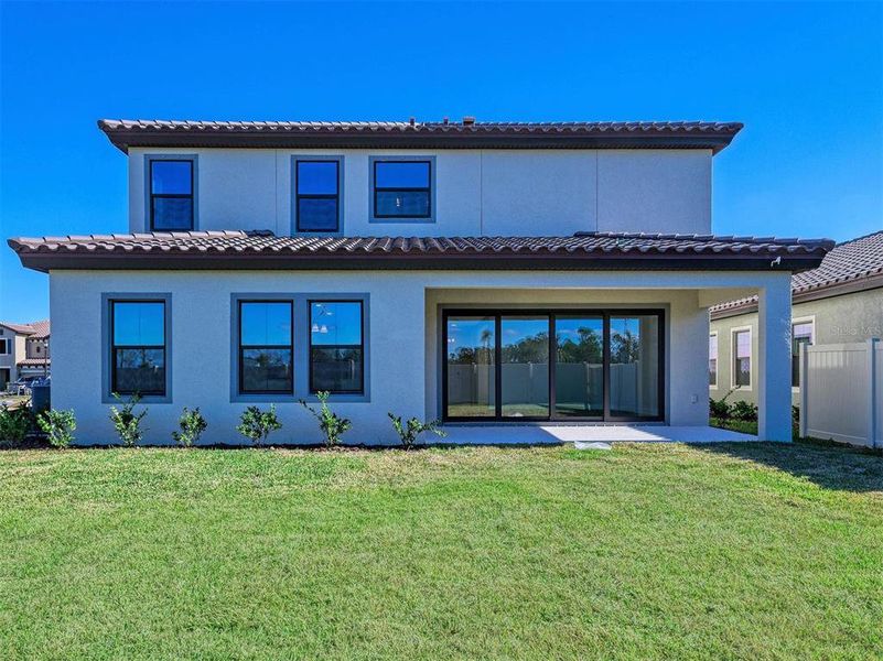Exterior details and patio area of a home in Crosswind Ranch, Parrish (Image 3).