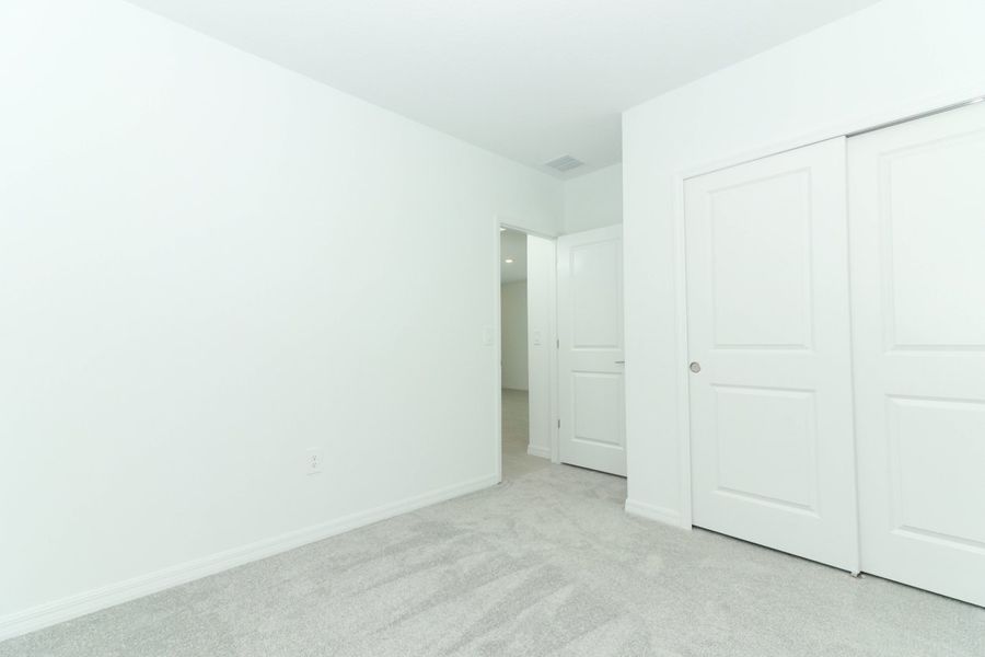Spacious, unfurnished interior of a new home in Marion Creek, Haines City (Image 32).
