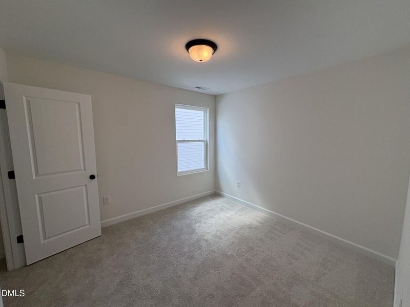 Spacious, unfurnished interior of a new home in Woodland Crossing, Zebulon (Image 37).