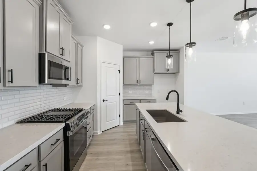 Furnished interior view inside a new home in Lisso, Pflugerville (Image 6).