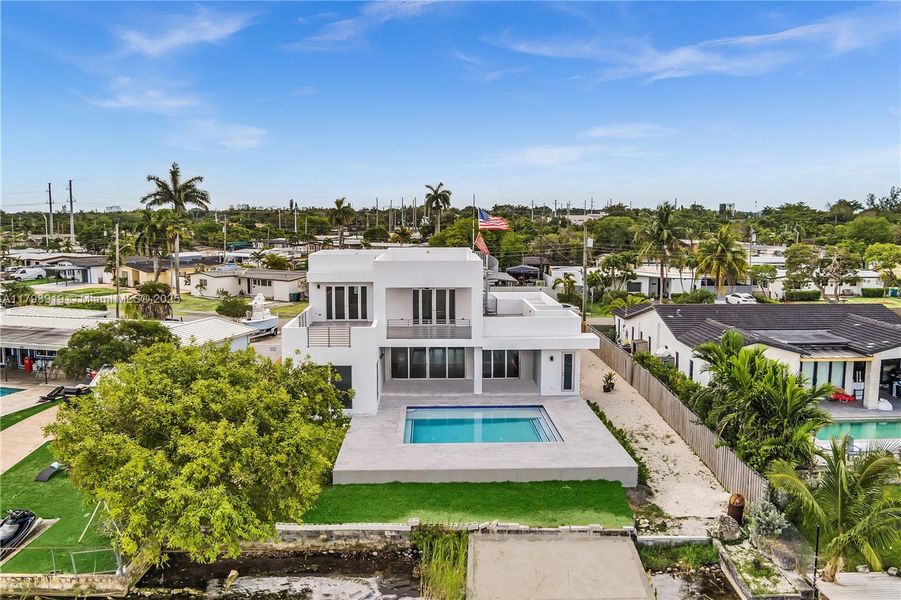 Front exterior of a new home in , Miami, FL, highlighting curb appeal (Image 16).