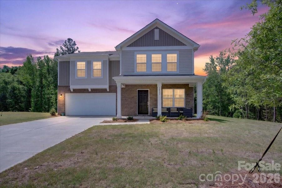 Front exterior of a new home in Walkers Mill, Edgemoor, SC, highlighting curb appeal (Image 27). Front exterior of a new home in Walkers Mill, Edgemoor, SC, highlighting curb appeal (Image 27).