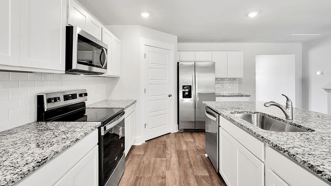 Furnished interior view inside a new home in Merchant Point, Jacksonville (Image 9).
