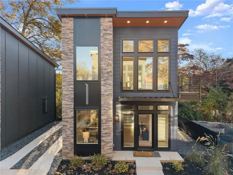 Front exterior of a new home in Villa Nova, Gainesville, GA, highlighting curb appeal (Image 19).