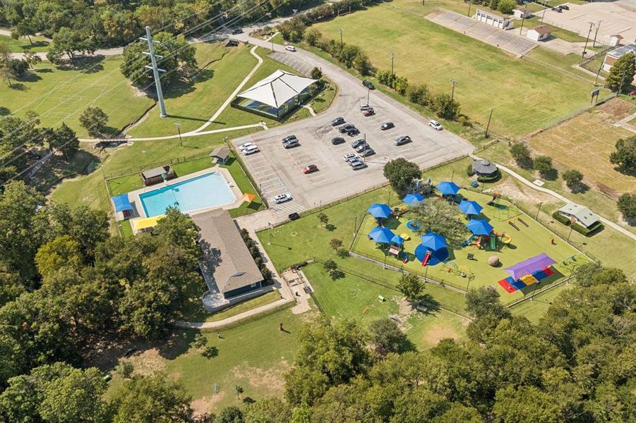 Aerial view of a pool area and a recreational park Aerial view of a pool area and a recreational park