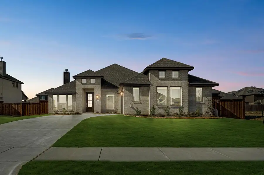 Front exterior of a new home in Somerset, Mansfield, TX, highlighting curb appeal (Image 2).