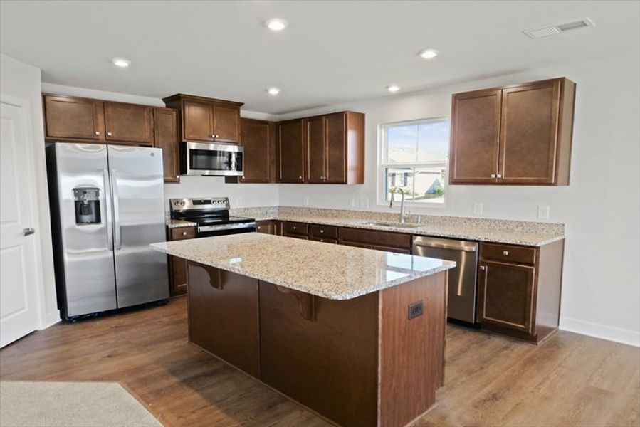Furnished interior view inside a new home in Reidville Town Center Cottages, Duncan (Image 4).