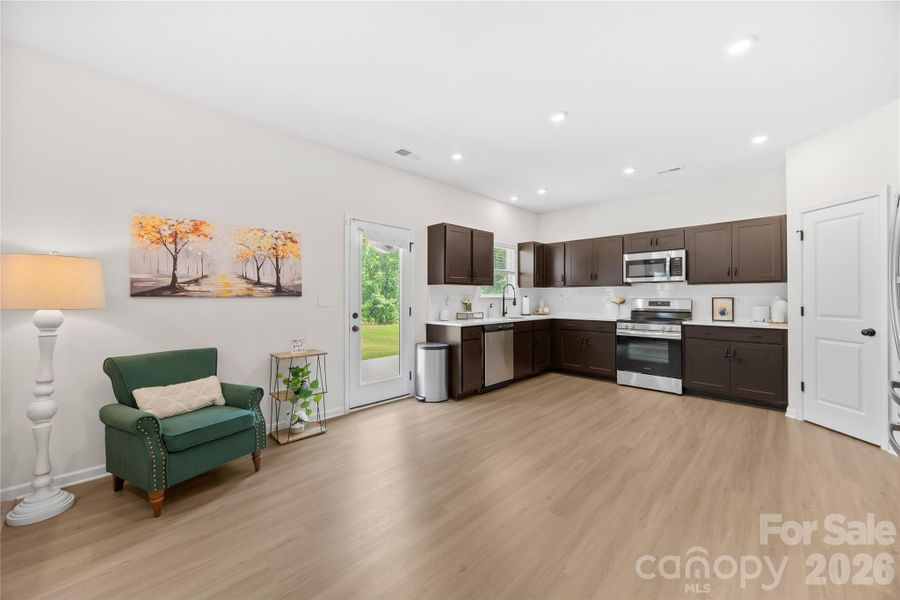 Furnished interior view inside a new home in Orchard Creek, Charlotte (Image 28).