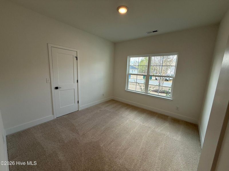 Spacious, unfurnished interior of a new home in Wood Creek Landing, Leland (Image 25). Spacious, unfurnished interior of a new home in Wood Creek Landing, Leland (Image 25).