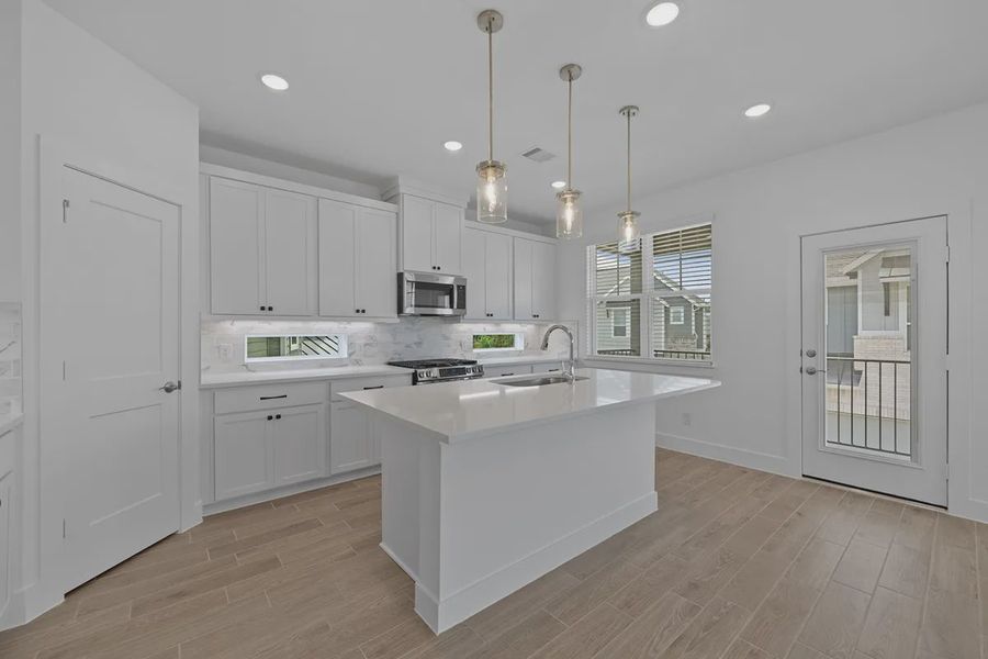 Furnished interior view inside a new home in Elyson Courtyard Collection, Katy (Image 6).