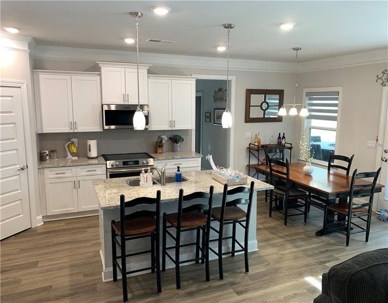 Furnished interior view inside a new home in Holiday Pines, Buford (Image 17).