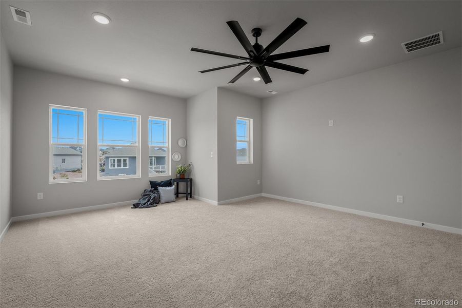Spacious, unfurnished interior of a new home in Revel Crossing at Wolf Ranch – The Outlook Collection, Colorado Springs (Image 32).