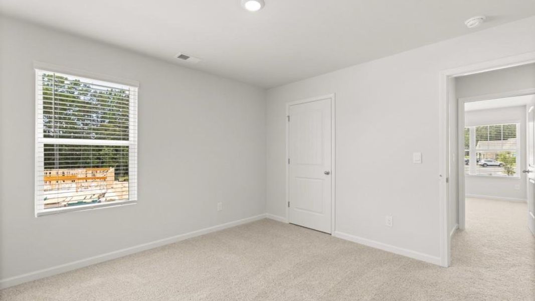 Spacious, unfurnished interior of a new home in Northwoods at Mirror Lake, Villa Rica (Image 31).