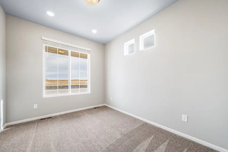 Spacious, unfurnished interior of a new home in The Reserve at Green Valley Ranch, Aurora (Image 22).