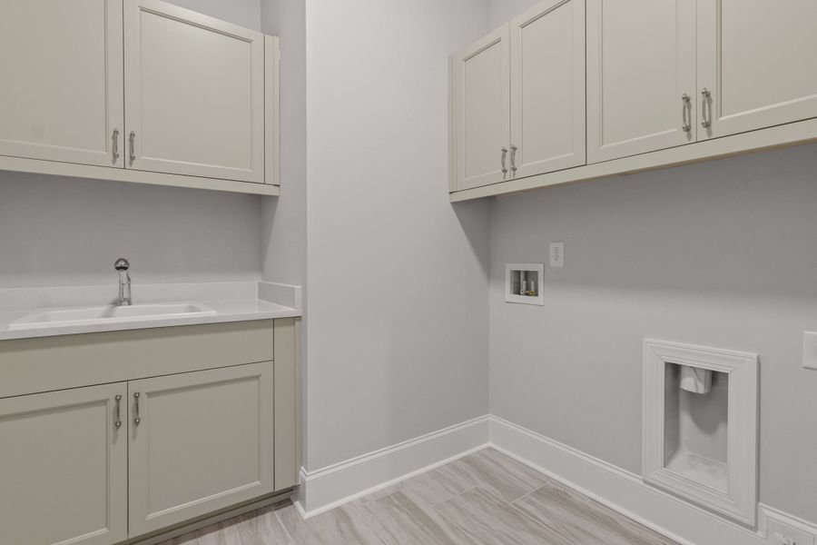 Representative furnished interior of a home built from the The Danville by The Providence Group in Bellwyn, Alpharetta (Image 19).