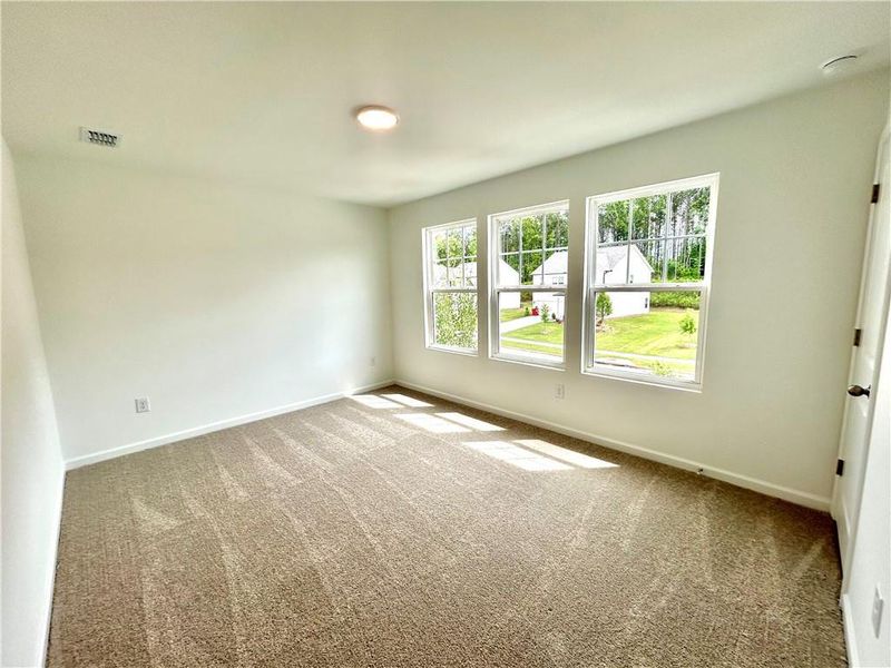 Spacious, unfurnished interior of a new home in The Pointe at Heron Bay, Locust Grove (Image 21).